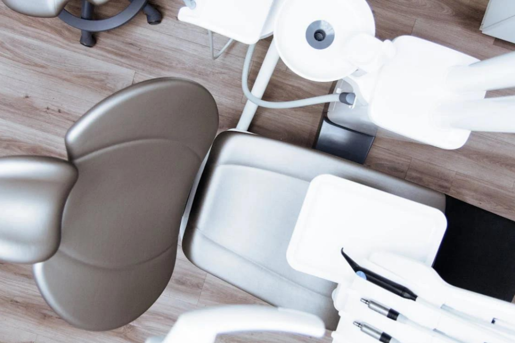 An overhead shot of a spotless dentist chair.