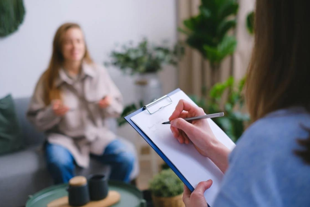 A woman with a clipboard asking another woman questions